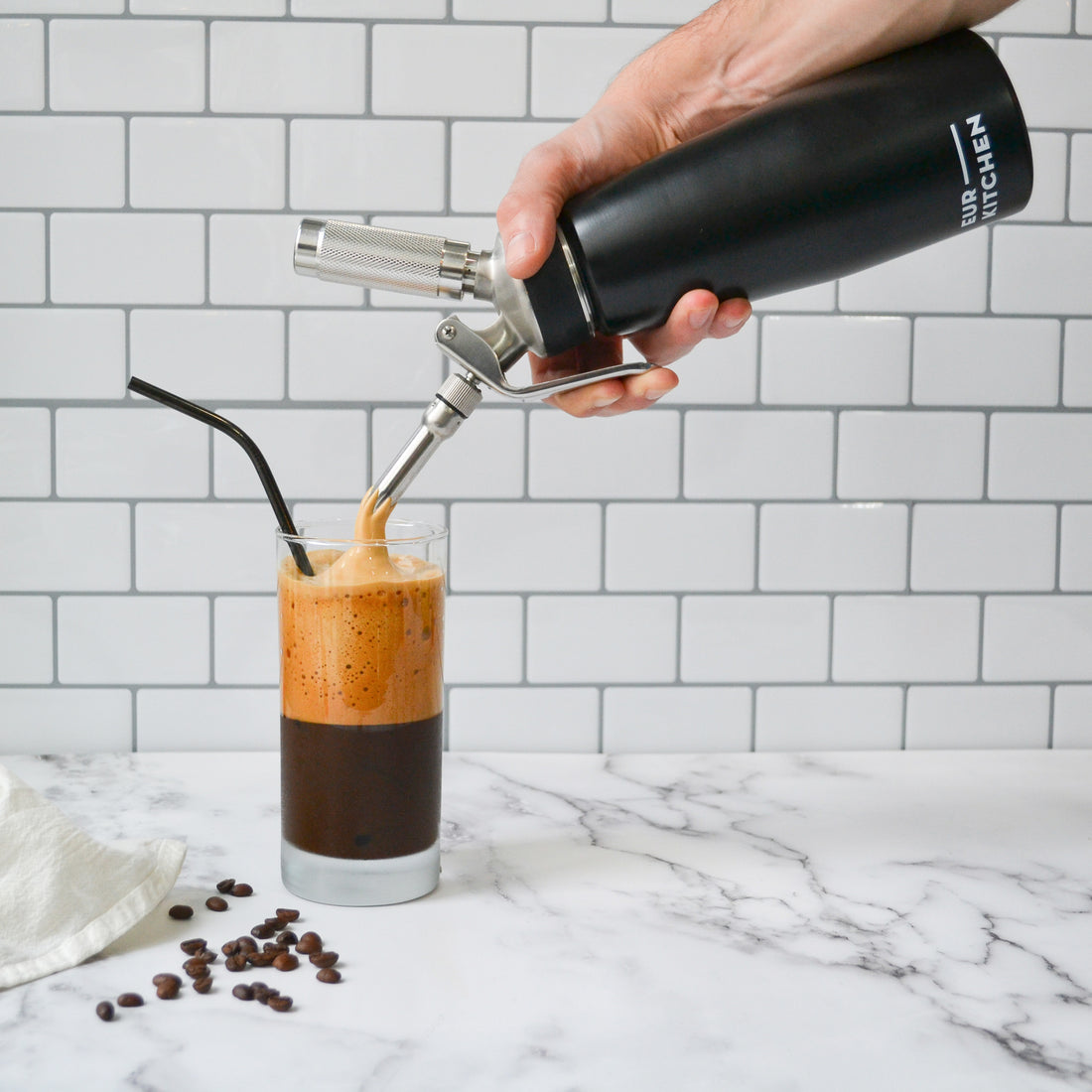 EurKitchen Whipped Cream Dispenser making coffee foam