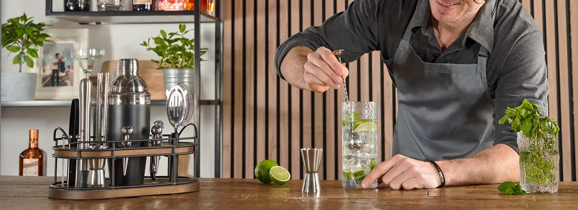 man prepping cocktails